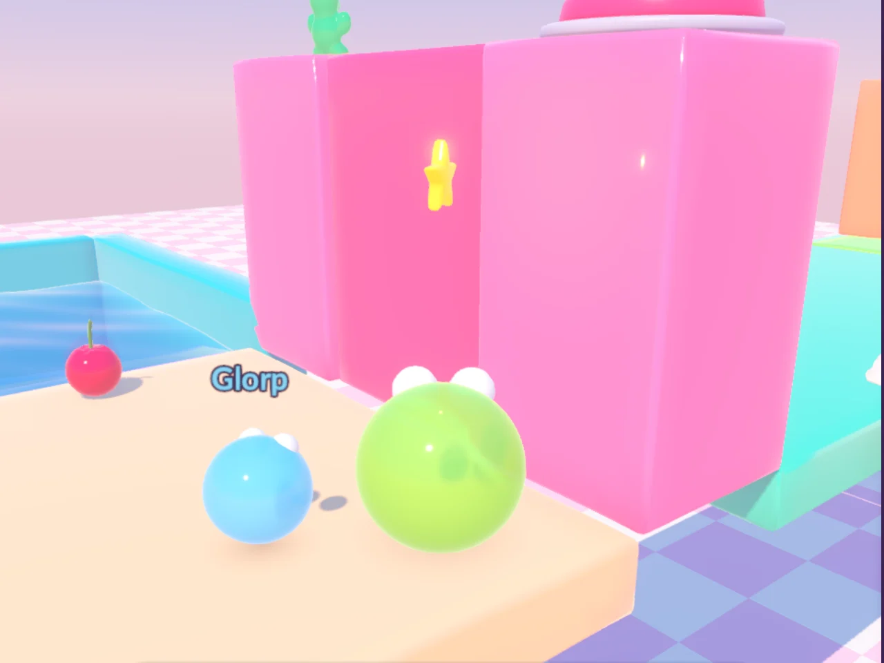 Two jelly blobs, a big green one and a small blue one labelled Glorp, at the foot of a tall pink jelly wall.